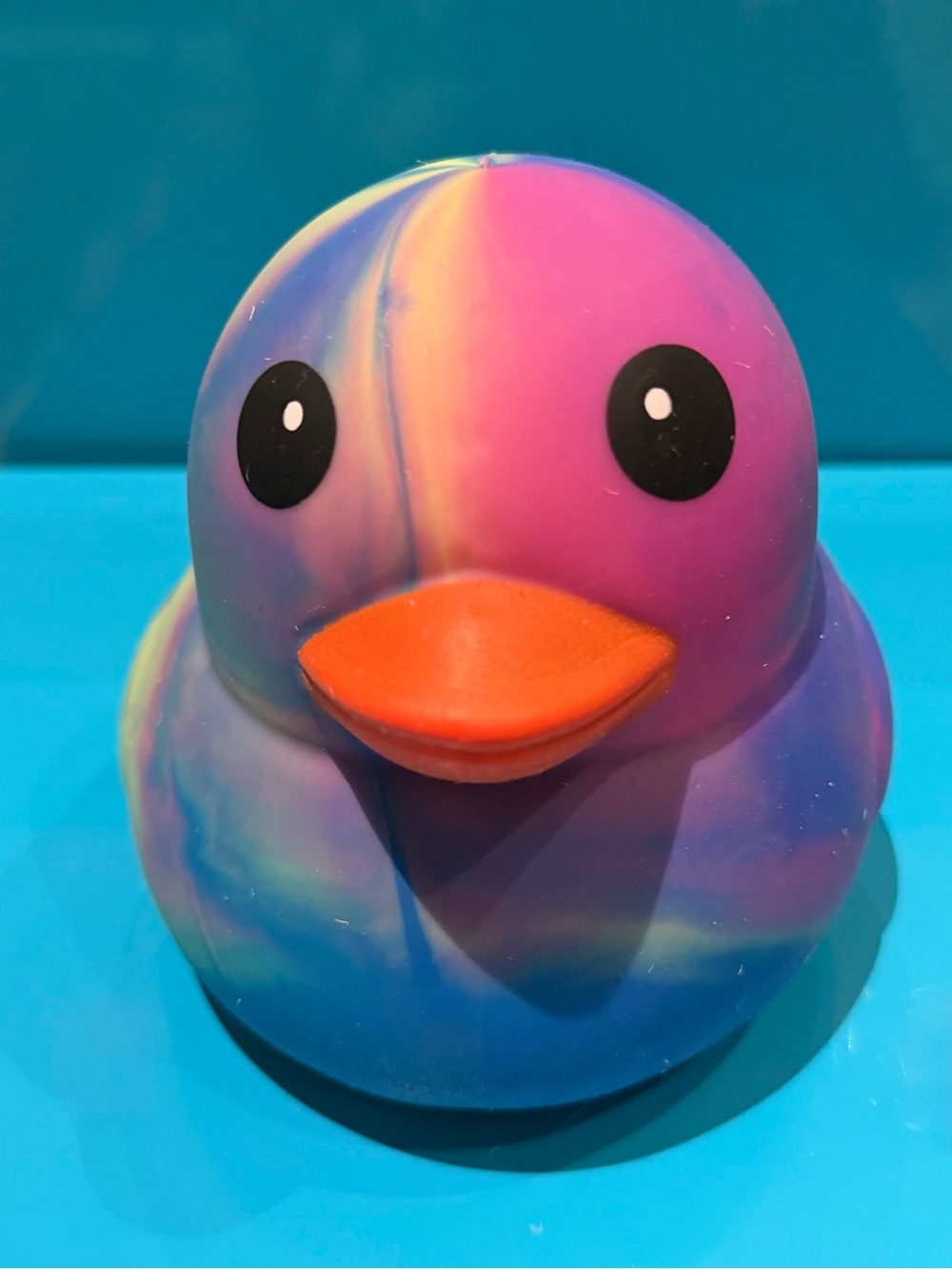 Tie dye duck squeezy fidget toy.